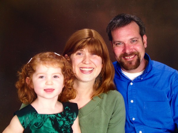 Clay Parker, his wife Laura, and their daughter.